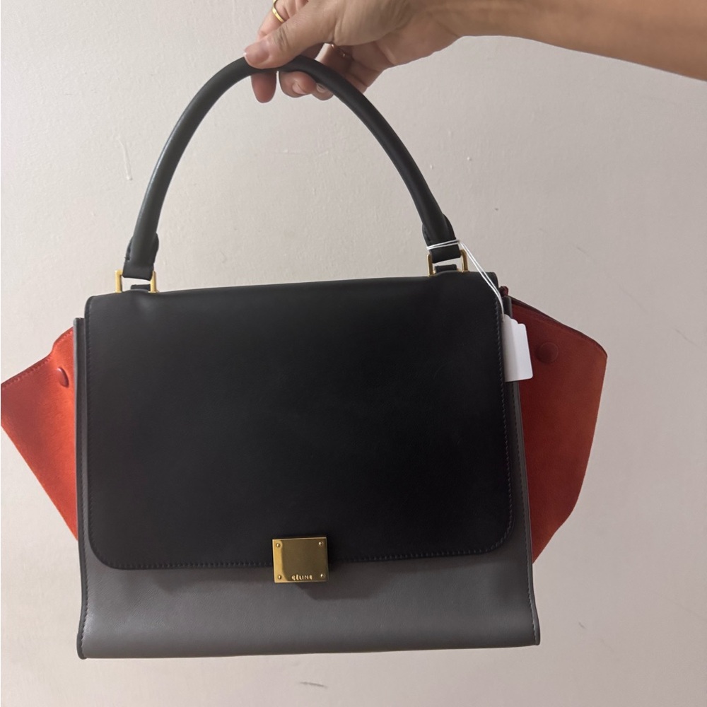 CELINE Trapeze purse Black and Orange Satchel.
Tricolor